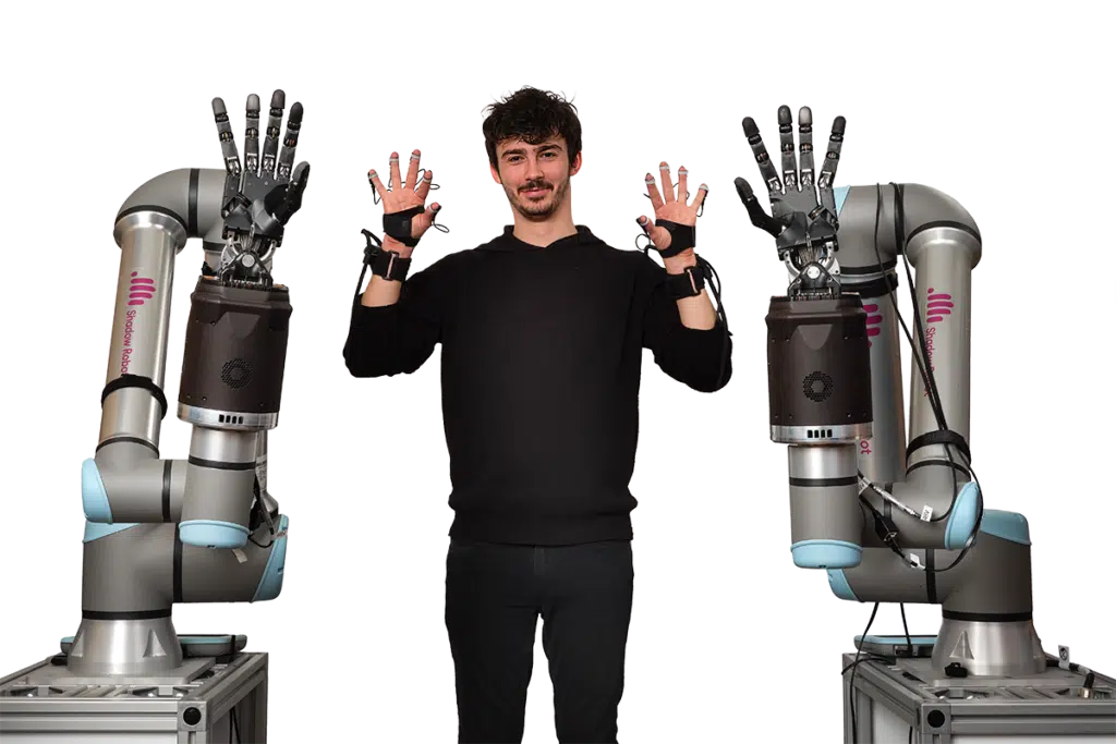 "Hands Up" Shadow Teleoperation system mimicking the movement of the operator in the background